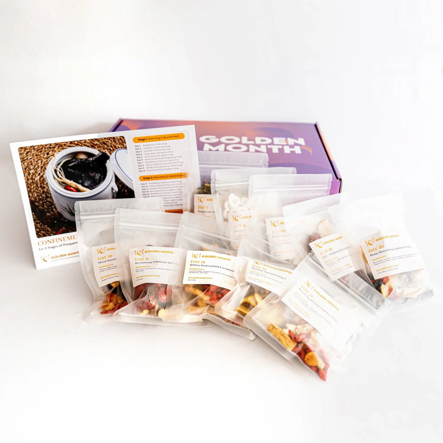 Assorted chinese confinemen soup packs with a 'Golden Month' box on a light background
